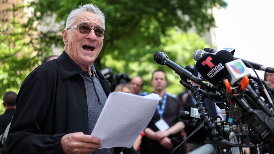 Robert De Niro speaks in support of President Joe Biden outside of Manhattan Criminal Court as former President and Republican presidential candidate Donald Trump attends his criminal trial for allegedly covering up hush money payments in New York City, on May 28. - Charly Triballeau/AFP/Getty Images