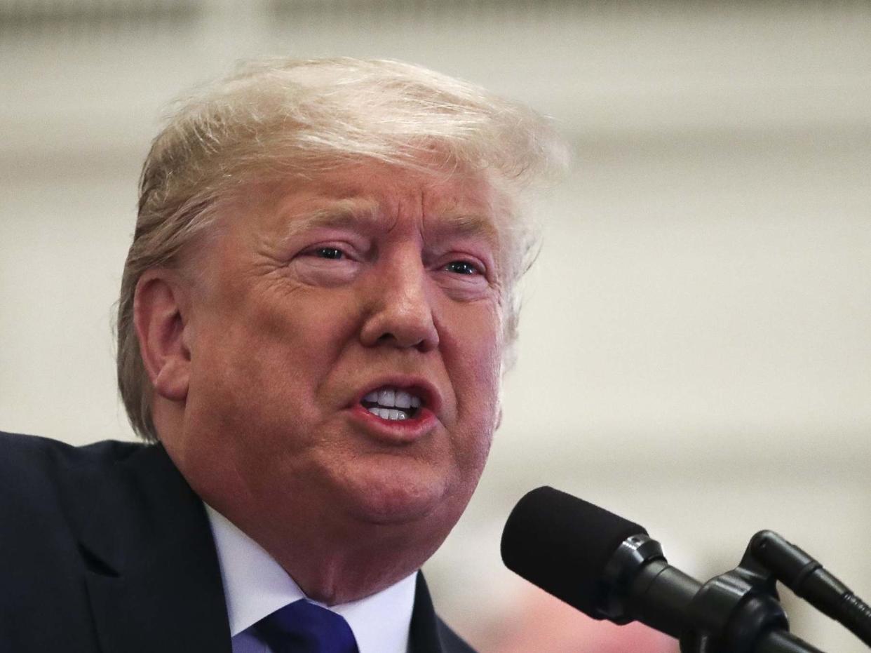 Donald Trump speaks during an event to honor this year's NCAA football champions Louisiana State University Tigers: Getty Images