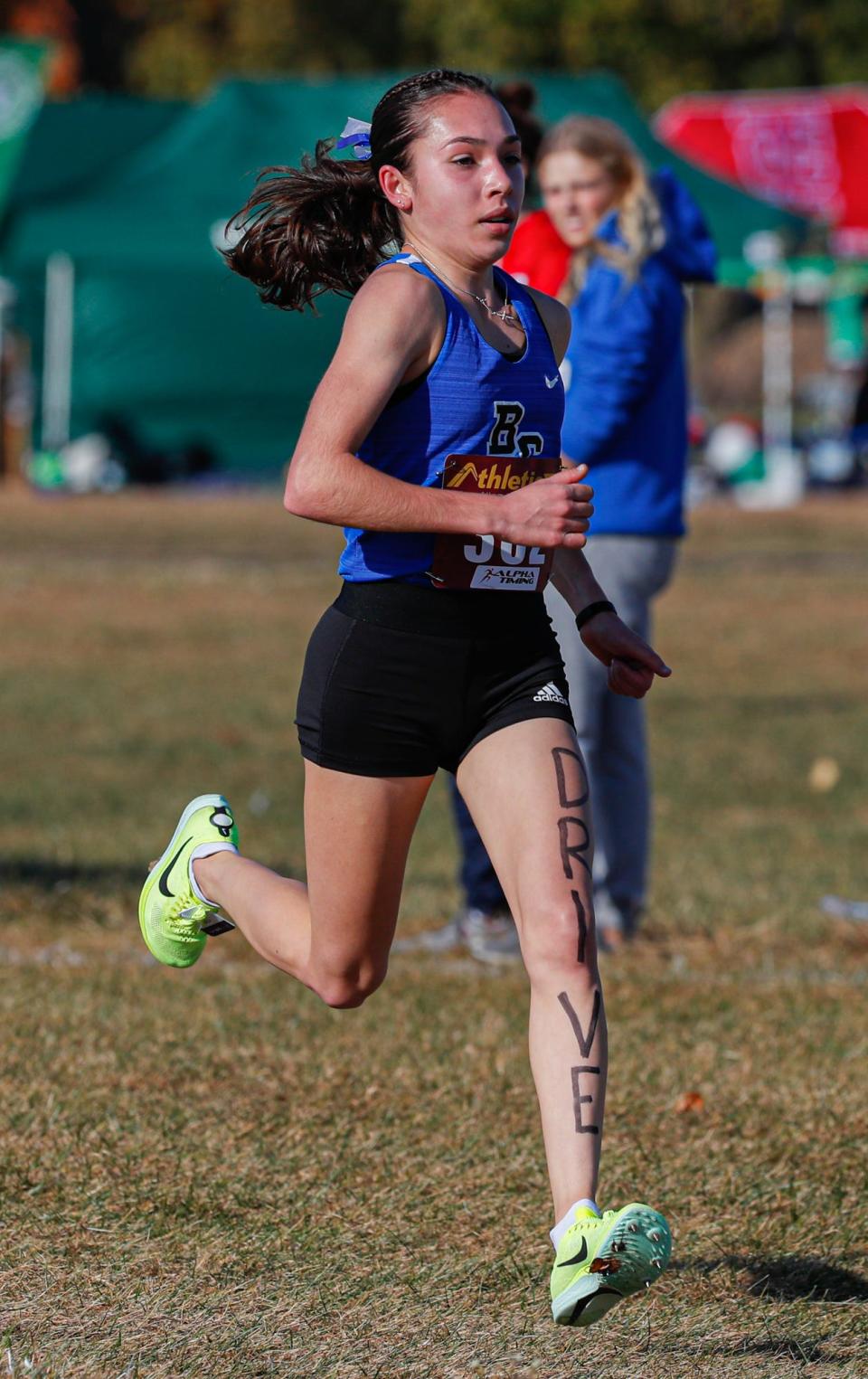 Bishop Chatard's Lily Cridge leads the girls 5K during the IHSAA girls and boys cross-country semi-state, on Saturday, Oct. 22, 2022, at Blue River Park Cross Country Course in Shelbyville Ind.