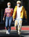 <p>Amber Rose and boyfriend Alexander Edwards hold hands after having breakfast at the Beverly Glen Deli restaurant in Bel-Air on Monday morning.</p>