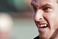 Andy Murray of Britain reacts during the men's singles match against Facundo Arguello of Argentina at the French Open tennis tournament at the Roland Garros stadium in Paris, France, May 25, 2015. REUTERS/Jean-Paul Pelissier