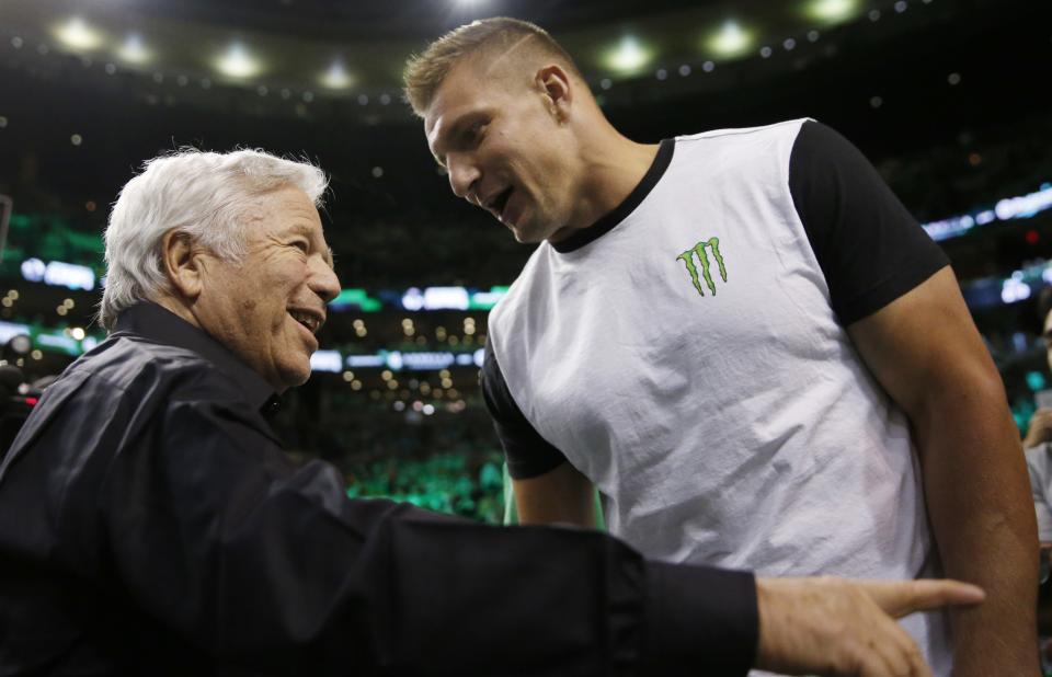 Usually the most tight-lipped team in the NFL, the New England Patriots, including owner Robert Kraft, left, and TE Rob Gronkowski, continue to find themselves in the headlines. (AP)