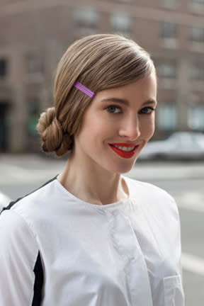 <div class="caption-credit"> Photo by: Refinery 29</div><b>Chic Chignon</b> <br> This pretty side bun is a lot easier that it looks. All you need is a comb, some clear elastics, bobby pins, and hairspray! <br> <i>Get the how-to at <a rel="nofollow noopener" href="http://www.refinery29.com/chignon/slideshow#slide-1" target="_blank" data-ylk="slk:Refinery 29;elm:context_link;itc:0;sec:content-canvas" class="link ">Refinery 29</a>.</i> <br> <b><i><a rel="nofollow noopener" href="http://www.babble.com/beauty/the-25-most-beautiful-easy-updos/?cmp=ELP|bbl|lp|YahooShine|Main||041813||Sponthe25mostbeautifuleasyupdos|famE|||" target="_blank" data-ylk="slk:For 18 more updo how-tos, visit Babble!;elm:context_link;itc:0;sec:content-canvas" class="link ">For 18 more updo how-tos, visit Babble!</a></i></b> <br> <br>