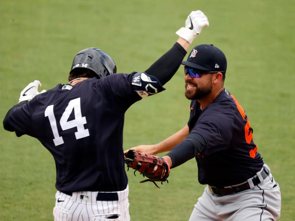 Detroit Tigers first baseman Renato Nunez (55) tags out New York Yankees shortstop Tyler Wade (14) on March 29, 2021, during the fifth inning at George M. Steinbrenner Field