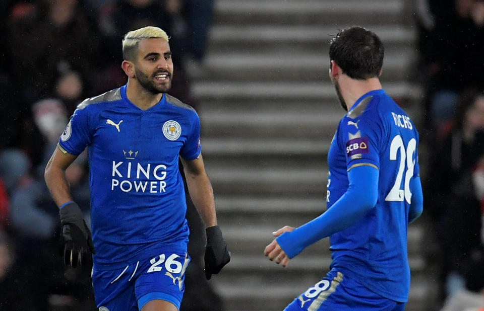 Leicester City’s Riyad Mahrez celebrates scoring their first goal with Christian Fuchs REUTERS/Toby Melville