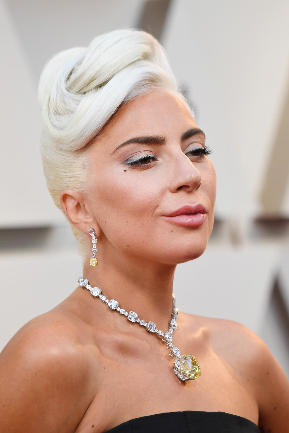 Lady Gaga at the Oscars in Los Angeles on Feb. 24. Makeup by <a href="https://www.instagram.com/p/BuSZFUEh80e/" target="_blank" rel="noopener noreferrer">Sarah Nicole Tanno﻿</a>. Hair by ﻿<a href="https://www.instagram.com/p/BuSkvgunGH5/" target="_blank" rel="noopener noreferrer">Frederic Aspiras</a>.