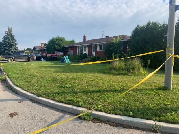 Ottawa police charged a 20-year-old man in the death of Christopher Avery Houghton inside a home on Sherry Lane in Nepean. (Natalia Goodwin/CBC - image credit)