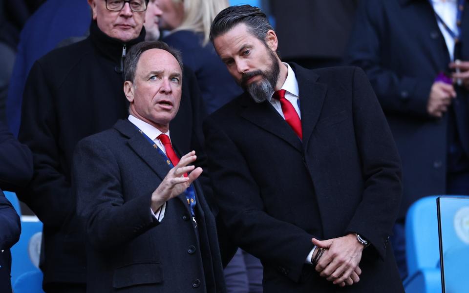 Tim Lewis and Josh Kroenke -