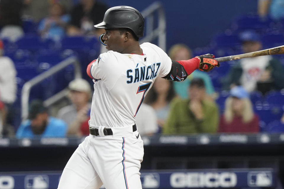 Miami Marlins Jesus Sanchez (7) hits a double to right field during the first inning of a baseball game against the Washington Nationals, Thursday, June 9, 2022, in Miami. (AP Photo/Marta Lavandier)