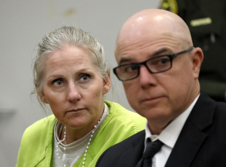 Santa Ana, CA - April 12: Courtney Fritz Pandolfi, left, who pleaded guilty to second-degree murder for a deadly collision that killed a pregnant mom and left her baby fighting for her life, is shown with defense attorney Fred Fascenelli, and was sentenced to 15-life with possibility of parole after serving 15 years at Central Justice Center in Santa Ana Friday, April 12, 2024. Yesenia Aguilar, who was eight-months pregnant with Adalyn at the time, were taking their daily walk when she was struck and killed on the sidewalk by convicted drunk driver Courtney Fritz Pandolfi. Doctors were able to perform a C-section and save Adalyn. (Allen J. Schaben / Los Angeles Times)