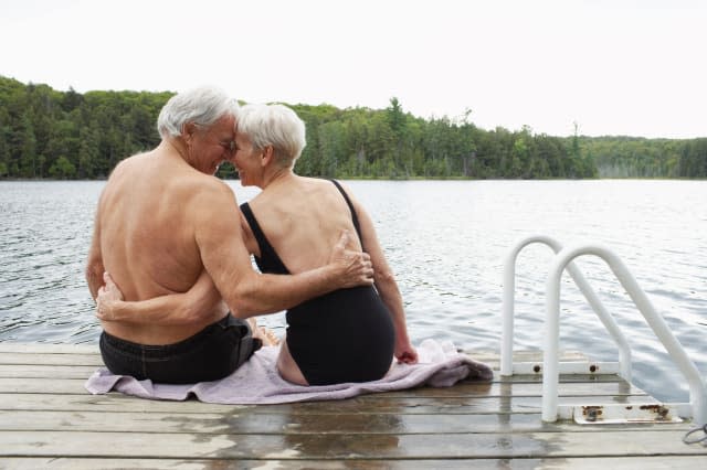 Couple Sitting on Dock