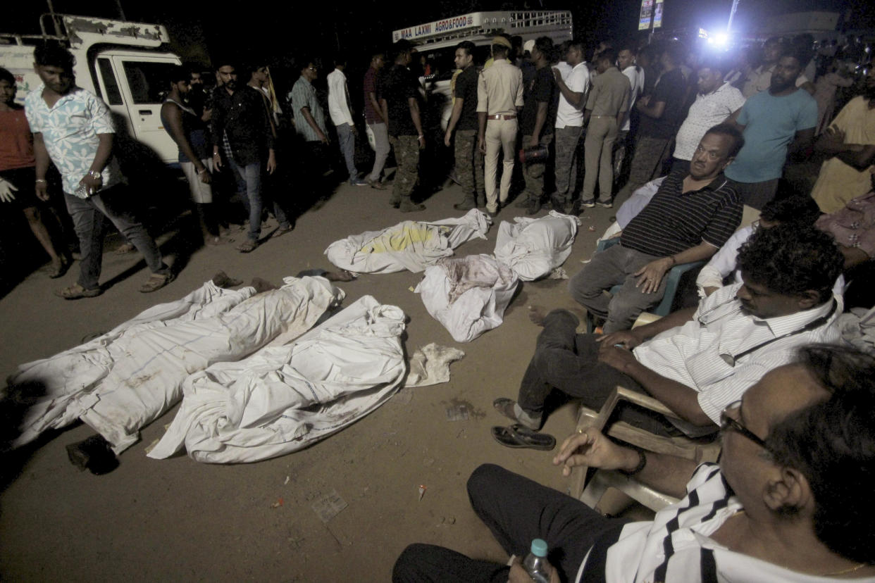 Bodies recovered from passenger trains lay at the site of an accident, in Balasore district, in the eastern Indian state of Orissa, Saturday, June 3, 2023. Two passenger trains derailed in India, killing more than 200 people and trapping hundreds of others inside more than a dozen damaged rail cars officials said. (AP Photo)