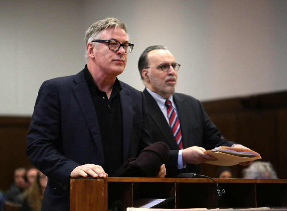 Alec Baldwin, left, in Manhattan Criminal Court on Jan. 23 to plead guilty to second-degree harassment related to an altercation he had with another man over a public parking space in November. (Photo: Alec Tabak-Pool/Getty Images)