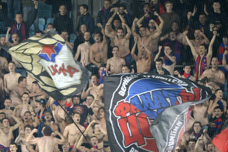 CSKA Moscow's fans support their team during the UEFA Champions League group B football match between CSKA Moscow and PSV Eindhoven at the Khimki Arena outside Moscow on September 30, 2015
