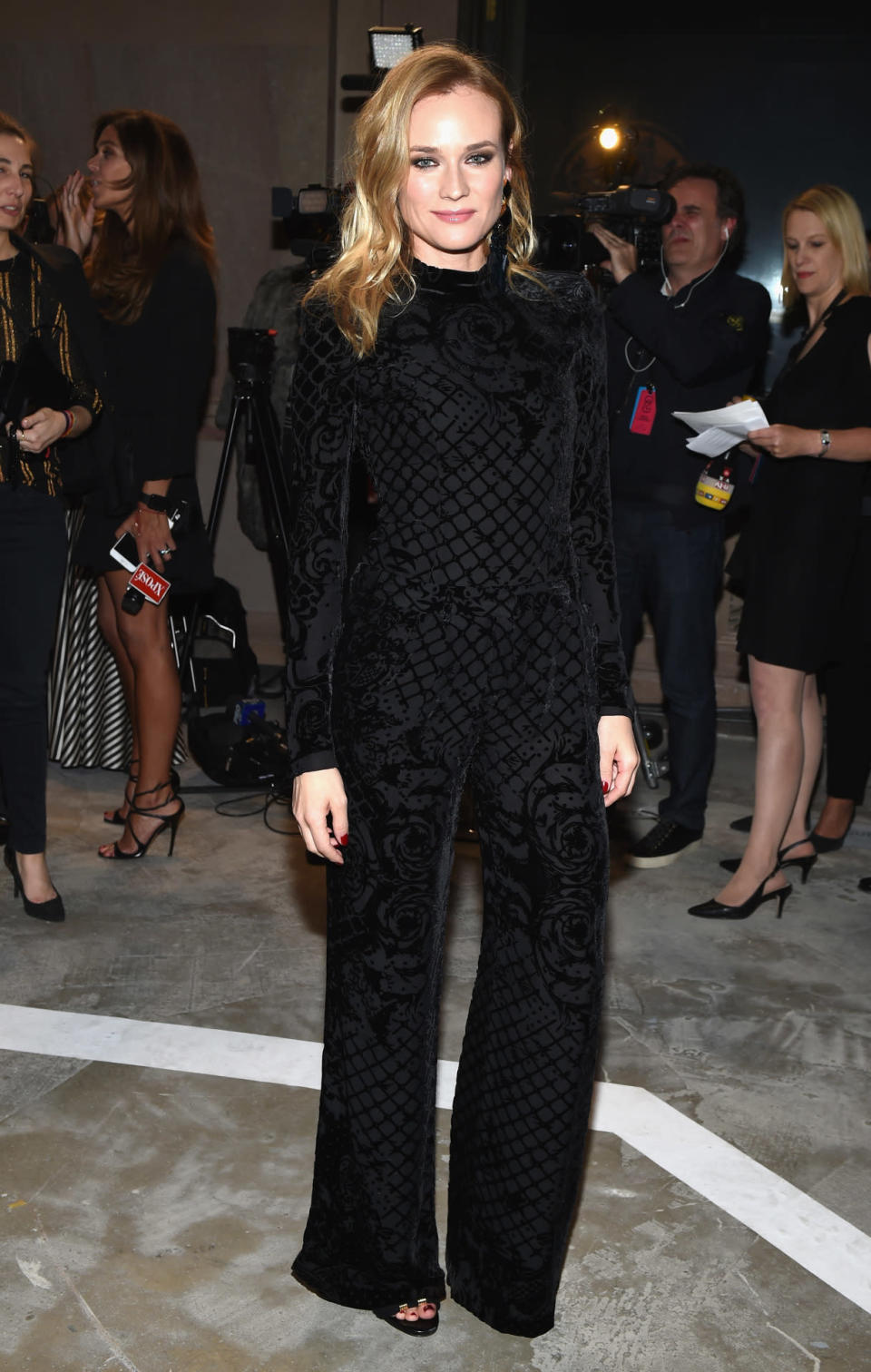 Diane Kruger in an all-black ensemble from the Balmain x H&M line. 