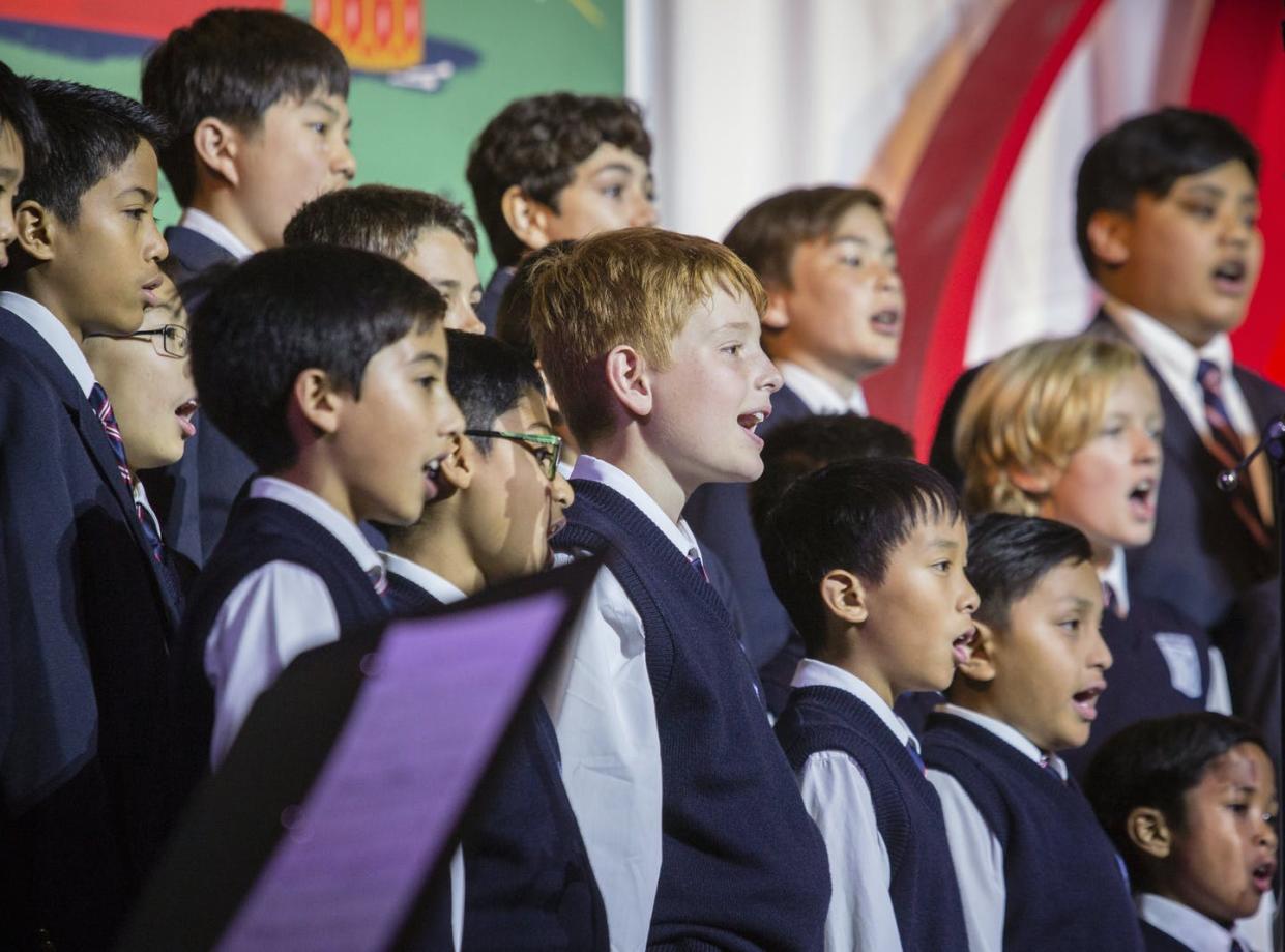 <span class="caption">Helping boys through their voice change can keep the joy of singing alive.</span> <span class="attribution"><a class="link " href="https://newsroom.ap.org/detail/MacysAnnualGreatTreeLighting/86b33d3b5cf244e186ea0733bc15fedc" rel="nofollow noopener" target="_blank" data-ylk="slk:Tomas Ovalle/AP Images for Macy's;elm:context_link;itc:0;sec:content-canvas">Tomas Ovalle/AP Images for Macy's</a></span>