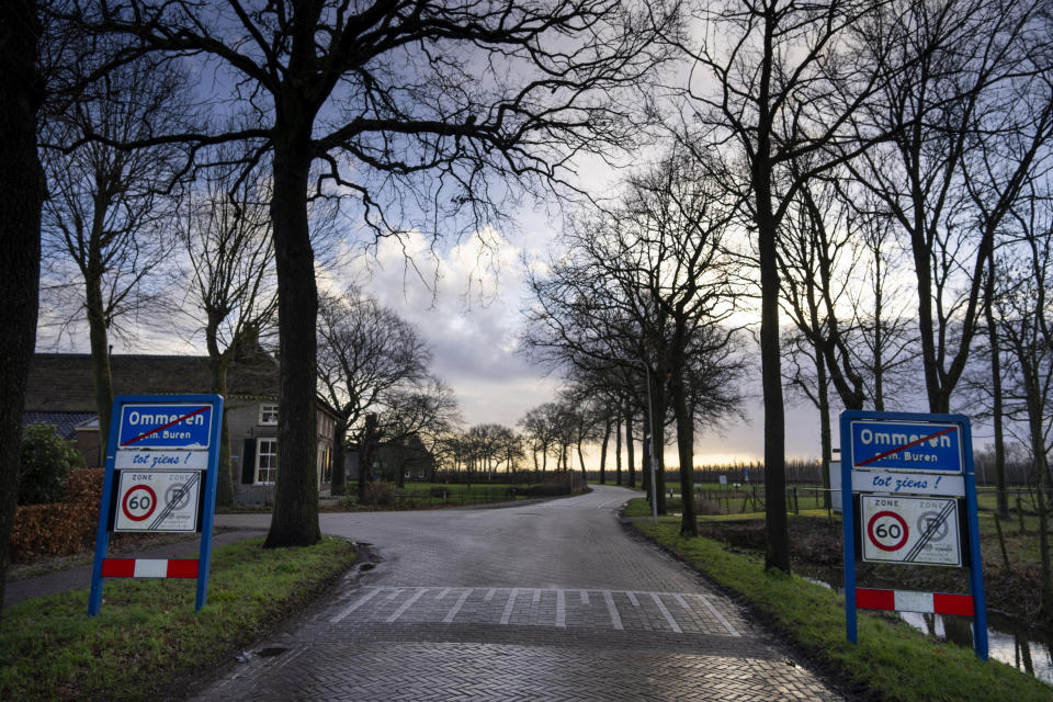 A sign indicates the village limits in Ommeren, near Arnhem, Netherlands, Thursday, Jan. 19, 2023. A hand-drawn map with a red letter X purportedly showing the location of a buried stash of precious jewellery looted by Nazis from a blown-up bank vault has sparked a modern-day treasure hunt in a tiny Dutch village. (AP Photo/Peter Dejong)