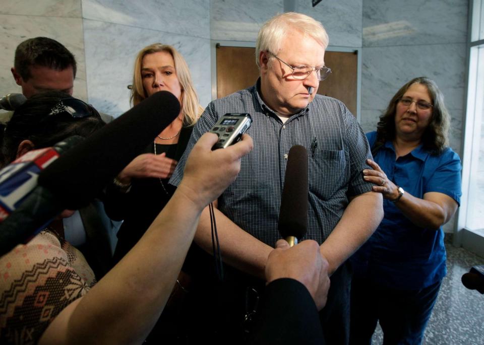 PHOTO: Chuck Cox, father of missing Utah mother Susan Powell, is comforted by his wife Judy, right, before speaking to reporters, June 15, 2012, in Tacoma, Wash. (Ted S. Warren/AP, FILE)