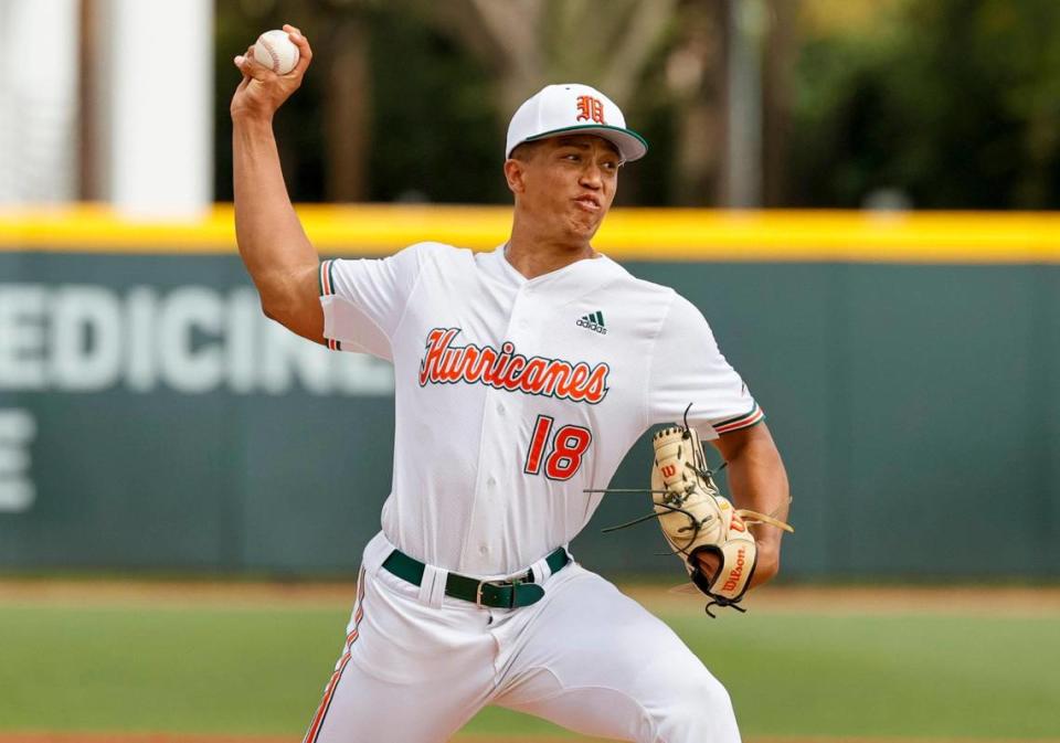 Miami Hurricanes pitcher Alex McFarlane (18) pitches during the third inning of an NCAA baseball game against the Towson Tigers in Alex Rodriguez Park at Mark Light Field on Sunday, February 20, 2022 in Coral Gables.