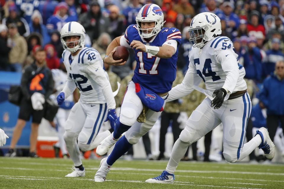 Buffalo Bills quarterback Josh Allen scrambles during the first half.