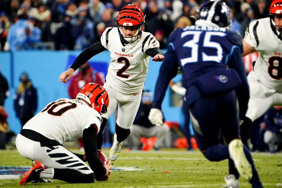 Cincinnati Bengals kicker Evan McPherson (2) kicks a field goal as time expires in the fourth quarter during an NFL divisional playoff football game, Saturday, Jan. 22, 2022, at Nissan Stadium in Nashville. The Cincinnati Bengals defeated the Tennessee Titans, 19-16, to advance to the AFC Championship game. 