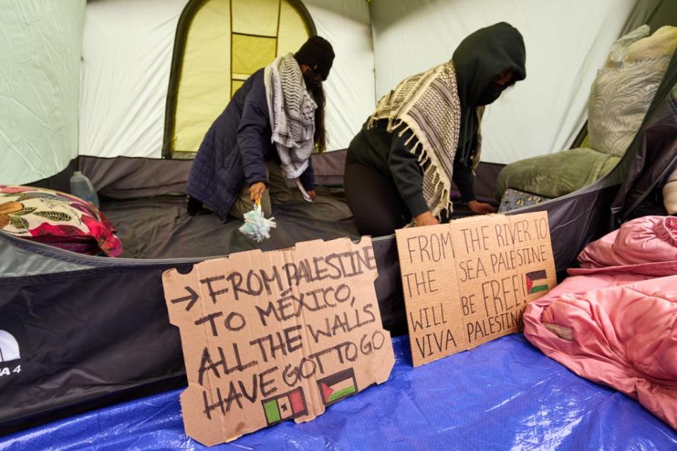 Pro-Palestinian demonstrators gather at an encampment on the lawn of Columbia University on Sunday. James Keivom