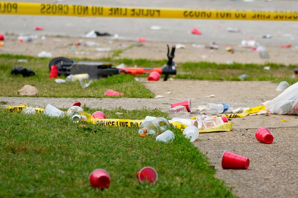 Party debris is seen in the area of a mass shooting incident in the Southern District of Baltimore, Sunday, July 2, 2023. Police say a number of people were killed and dozens were wounded in a mass shooting that took place during a block party just after midnight. 