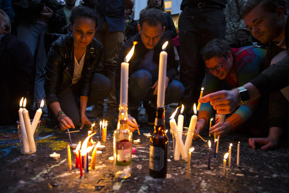 People light candles during a vigil for the victims of the Orlando nightclub shooting, on Old Compton Street, Soho on June 13, 2016 in London, England.&nbsp;