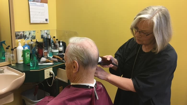 Barber who cut into a man's world retires after 4 decades