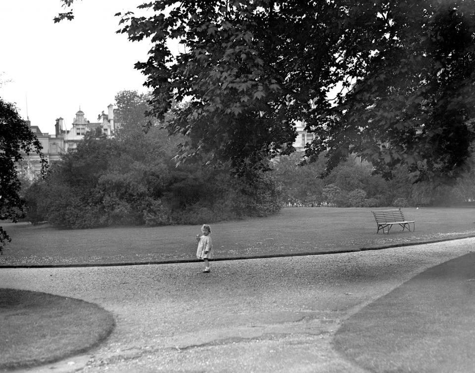 <p>Princess Elizabeth at play in her garden in Piccadilly (PA Archive) </p>