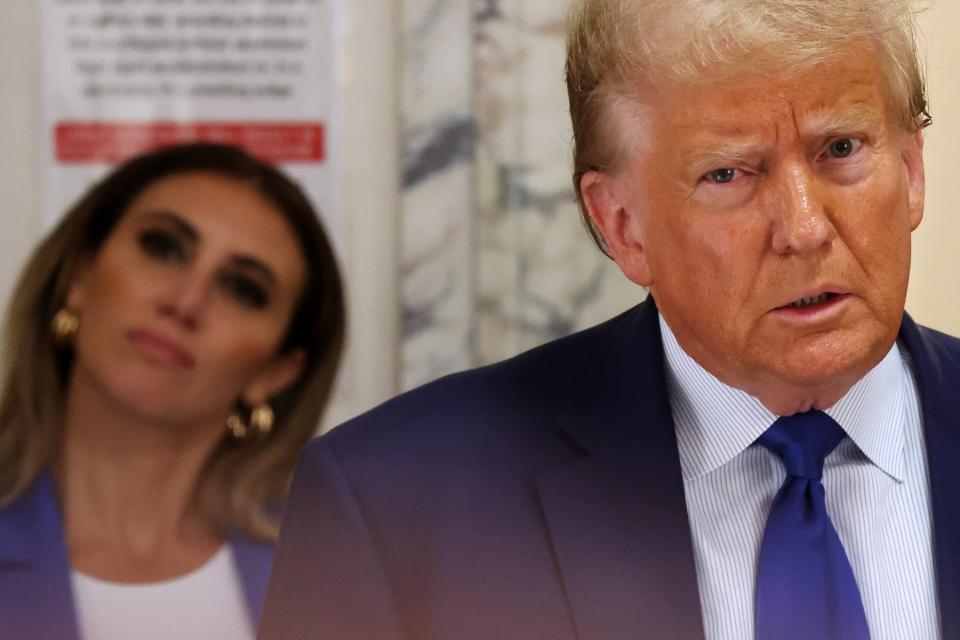 Trump attorney Alina Habba appears with her client inside New York Supreme Court on 25 October. (Getty Images)