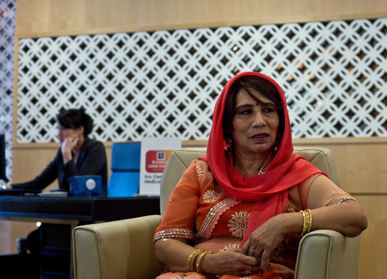Bangladeshi woman Nusrat Hussein Kiwan sits at the International Patients Centre reception area, at a private hospital in Kuala Lumpur, on December 9, 2014