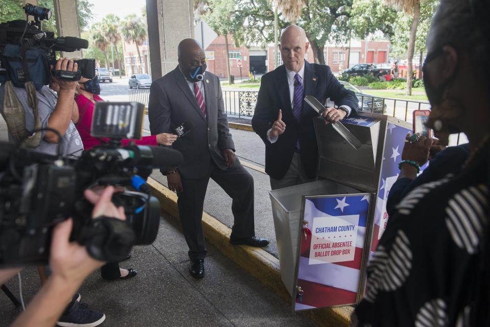 Savannah Mayor Van Johnson, left, and Board of Registrars Chairman Colin McRae talk to members of the media at a press conference about absentee ballot drop box locations at the Savannah Civic Center on Sept. 29.