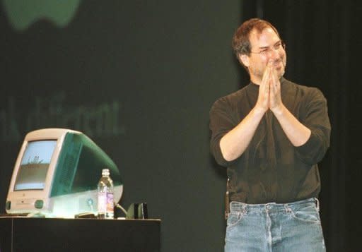 File picture from 1998 shows Steve Jobs giving the keynote address at the Seybold San Francisco Publishing 98 conference standing next to the newly released iMac Jobs has died from cancer aged just 56, a premature end for a man who revolutionized modern culture and changed forever the world's relationship to technology