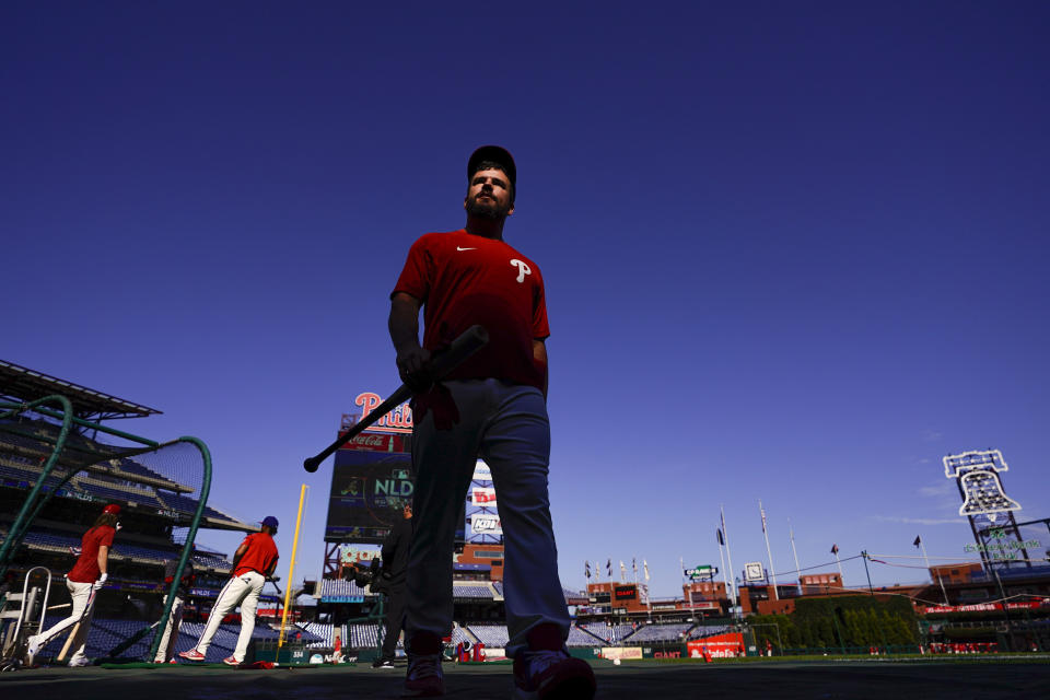 Philadelphia Phillies left fielder Kyle Schwarber (12) before Game 4 of baseball's National League Division Series between the Philadelphia Phillies and the Atlanta Braves, Saturday, Oct. 15, 2022, in Philadelphia. (AP Photo/Matt Slocum)