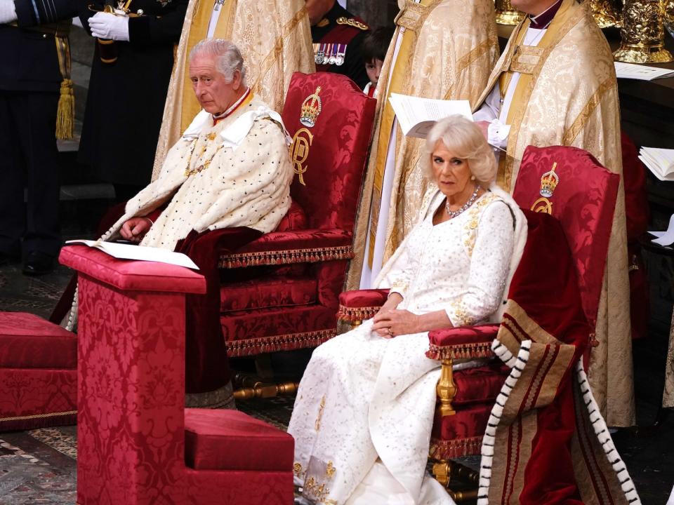 King Charles and Queen Camilla on their thrones at the coronation on May 6, 2023.