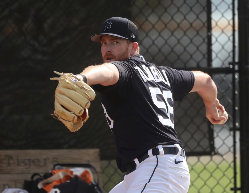 Detroit Tigers pitcher Spencer Turnbull warms up before live batting practice during spring training at TigerTown in Lakeland, Fla., on Thursday, Feb. 23, 2023.