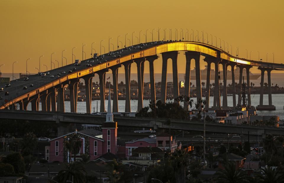 The Coronado Bridge, a gently curving concrete span, has become one of the city's dominant icons.