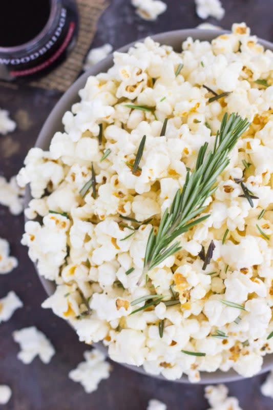 <p>Pumpkin ‘n Spice</p><p>This Rosemary Garlic Popcorn is drizzled with a buttery mix filled with fresh rosemary and a hint of garlic. Simple, easy and perfect for entertaining, this crunchy snack is sure to be the hit of any party! </p><p><strong>Get the recipe: <a href="https://www.pumpkinnspice.com/rosemary-garlic-popcorn/" rel="nofollow noopener" target="_blank" data-ylk="slk:Rosemary Garlic Popcorn;elm:context_link;itc:0;sec:content-canvas" class="link ">Rosemary Garlic Popcorn</a></strong></p>