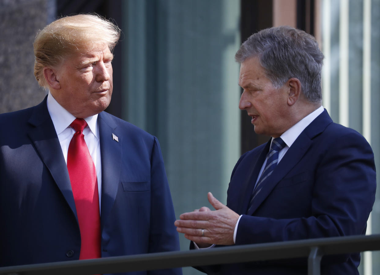 US president Donald Trump says he discussed forest raking with Finnish president Sauli Niinisto (Picture: AP)