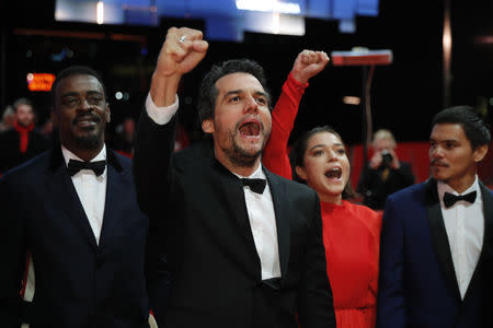 Director and screenwriter Wagner Moura and cast members arrive for the screening of the movie "Marighella" at the 69th Berlinale International Film Festival in Berlin, Germany, February 15, 2019. REUTERS/Hannibal Hanschke
