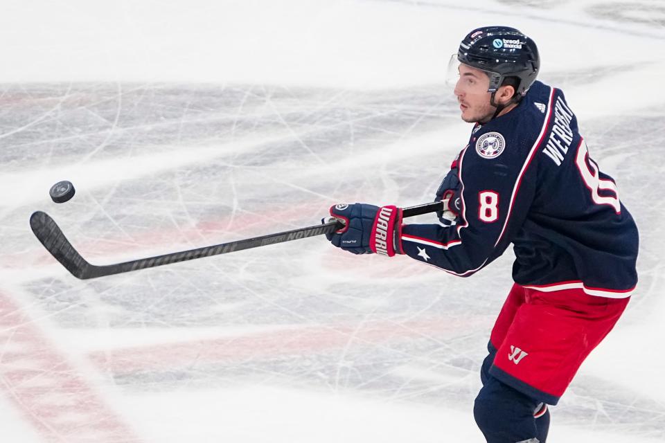 Mar 14, 2024; Columbus, Ohio, USA; Columbus Blue Jackets defenseman Zach Werenski (8) hits a puck during the second period of the NHL hockey game against the Ottawa Senators at Nationwide Arena.