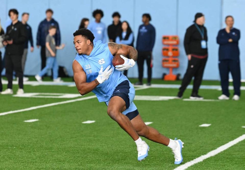 Linebacker Cedric Gray runs upfield after catching a ball during the Carolina Football Pro Day at UNC Chapel Hill’s Koman Indoor Practice Facility on Thursday, March 28, 2024. JEFF SINER/jsiner@charlotteobserver.com