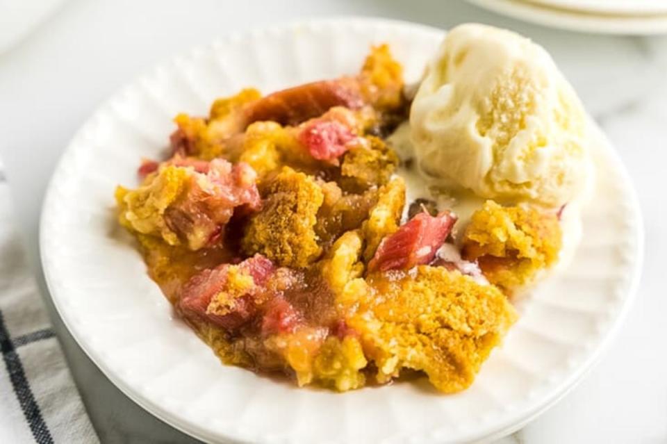 <p>Julie's Eats and Treats</p><p>Dump cakes are perfect when you're too busy to worry about complicated desserts.</p><p><strong>Get the recipe: <a href="https://www.julieseatsandtreats.com/rhubarb-crunch/" rel="nofollow noopener" target="_blank" data-ylk="slk:Rhubarb Dump Cake;elm:context_link;itc:0;sec:content-canvas" class="link ">Rhubarb Dump Cake</a></strong></p>