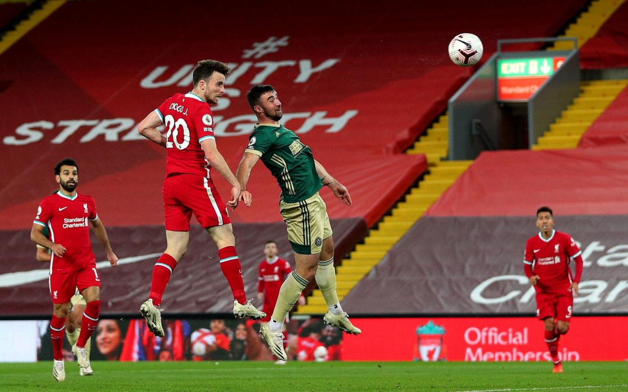 Liverpool's Diogo Jota scores his side's second goal of the game during the Premier League match at Anfield, Liverpool.  - PA