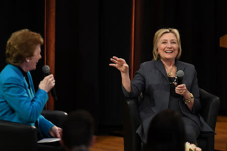 Former US Secretary of State Hillary Clinton speaks with former President of Ireland, Mary Robinson during a public lecture at Trinity College Dublin, Ireland June 22, 2018. REUTERS/Clodagh Kilcoyne