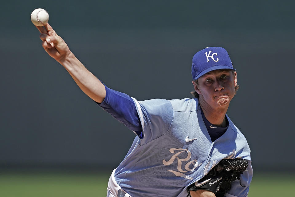 Kansas City Royals starting pitcher Brady Singer throws during the first inning of the first game of a baseball doubleheader Tuesday, Aug. 9, 2022, in Kansas City, Mo. (AP Photo/Charlie Riedel)