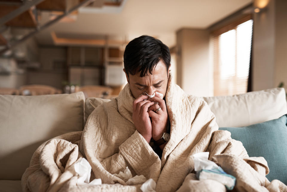 Man suffering from cold. (Getty Images)