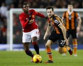 Britain Football Soccer - Manchester United v Hull City - EFL Cup Semi Final First Leg - Old Trafford - 10/1/17 Manchester United's Paul Pogba in action with Hull City's Ryan Mason Action Images via Reuters / Jason Cairnduff Livepic