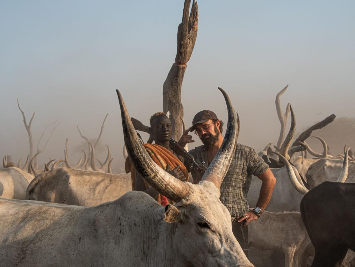 <p>Independent shareholder Evgeny Lebedev meets a herder at a cattle camp in South Sudan</p> (Valentina Morriconi)